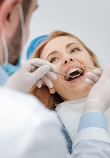 A dentist near Glastonbury performing a dental checkup