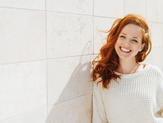 Woman smiling outside