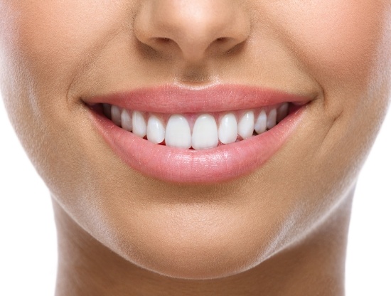 Close up of smile with straight white teeth