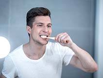 Man brushing teeth to prevent dental emergencies in Rocky Hill