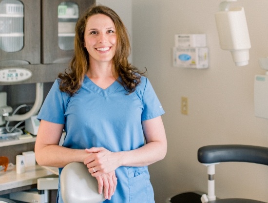 Doctor Karpman standing in dental treatment room