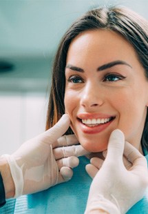 A dentist near Wethersfield performing cosmetic dentistry
