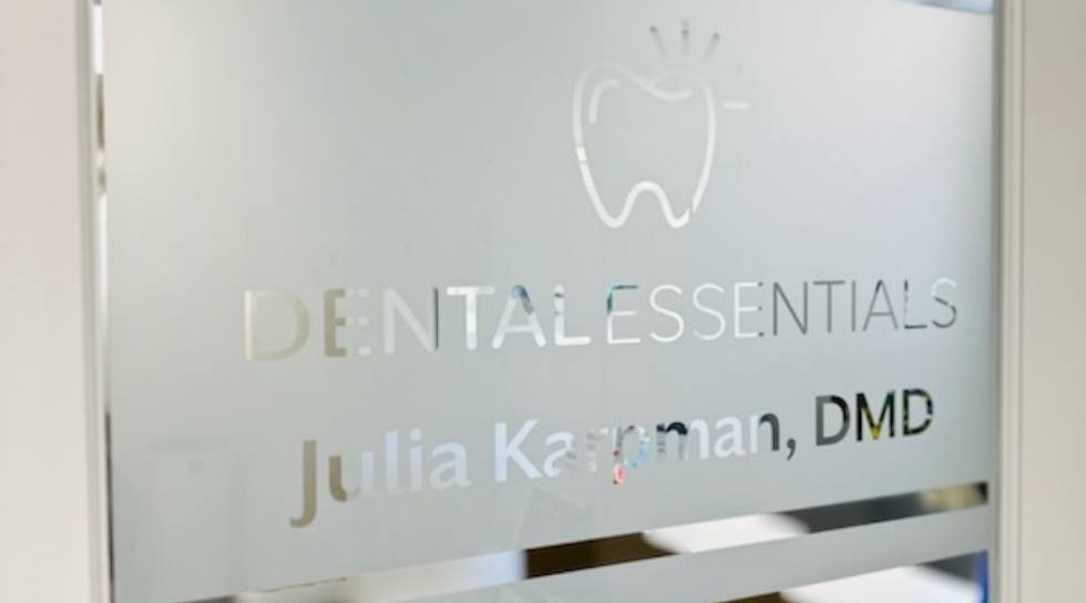 Dental Essentials of Rocky Hill logo on outside of glass door
