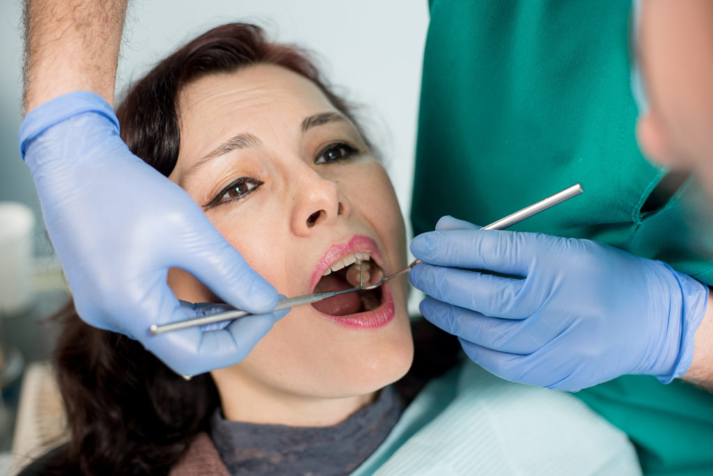 patient getting dental emergency treatment in Rocky Hill